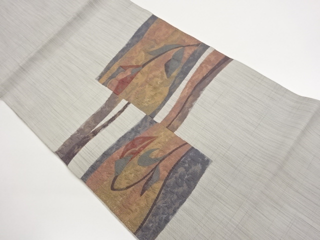 ふくれ織変わり色紙に抽象花模様織出し開き名古屋帯（額縁仕立て）